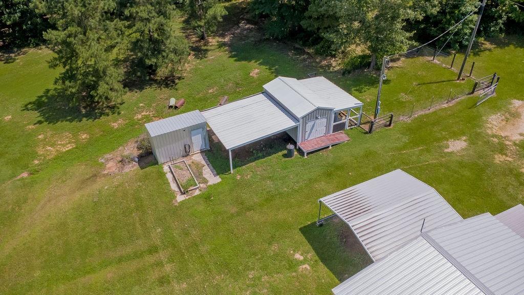 636 Roberson Road Hallsville, TX 75650 - Photo 9 of 36 an aerial view of a house with swimming pool garden and patio