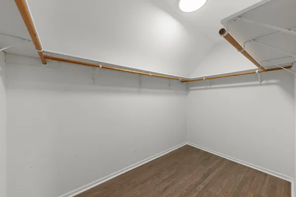 a view of an empty walk in closet