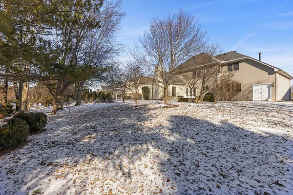 a view of a yard with a house