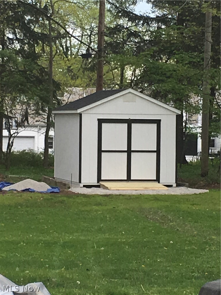 4903 Middledale Road Lyndhurst, OH 44124 - Photo 24 of 29 Large shed for your tractor or landscaping needs