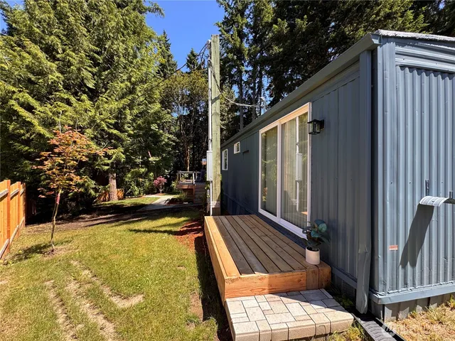a view of sitting area in front of house