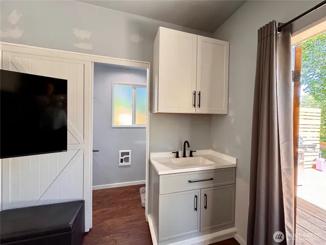 a bathroom with a shower and toilet