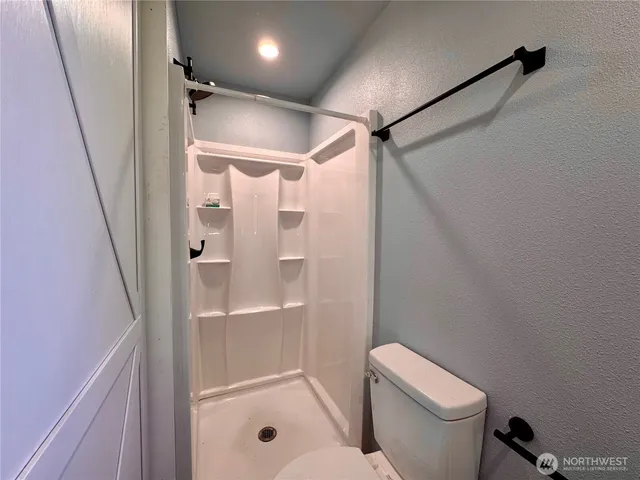 a bathroom with a sink mirror and a vanity