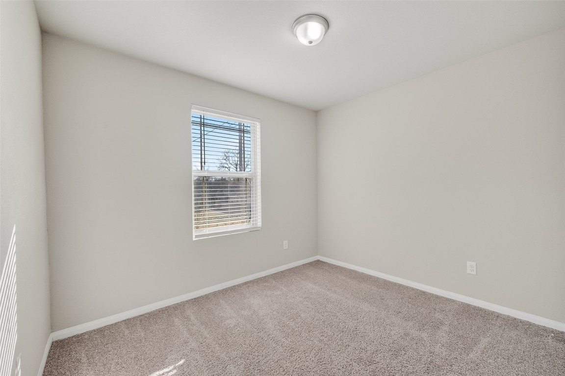 2516 Boss Street La Marque, TX 77568 - Photo 15 of 46 an empty room with a window