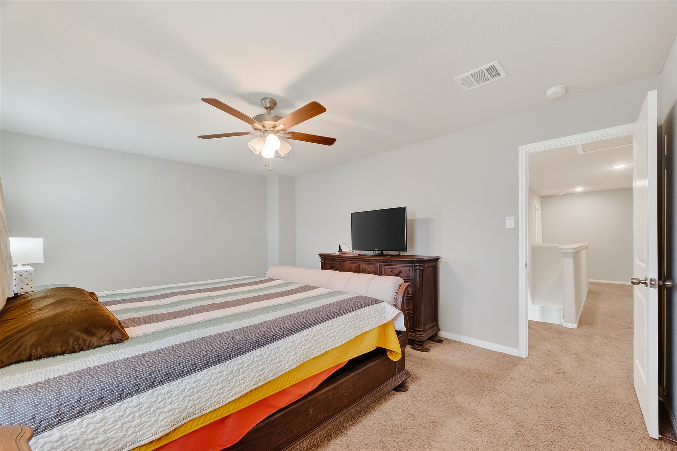 2516 Boss Street La Marque, TX 77568 - Photo 28 of 46 a bedroom with a bed and a tv