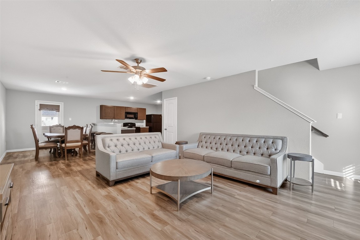 2516 Boss Street La Marque, TX 77568 - Photo 39 of 46 a living room with furniture and a wooden floor