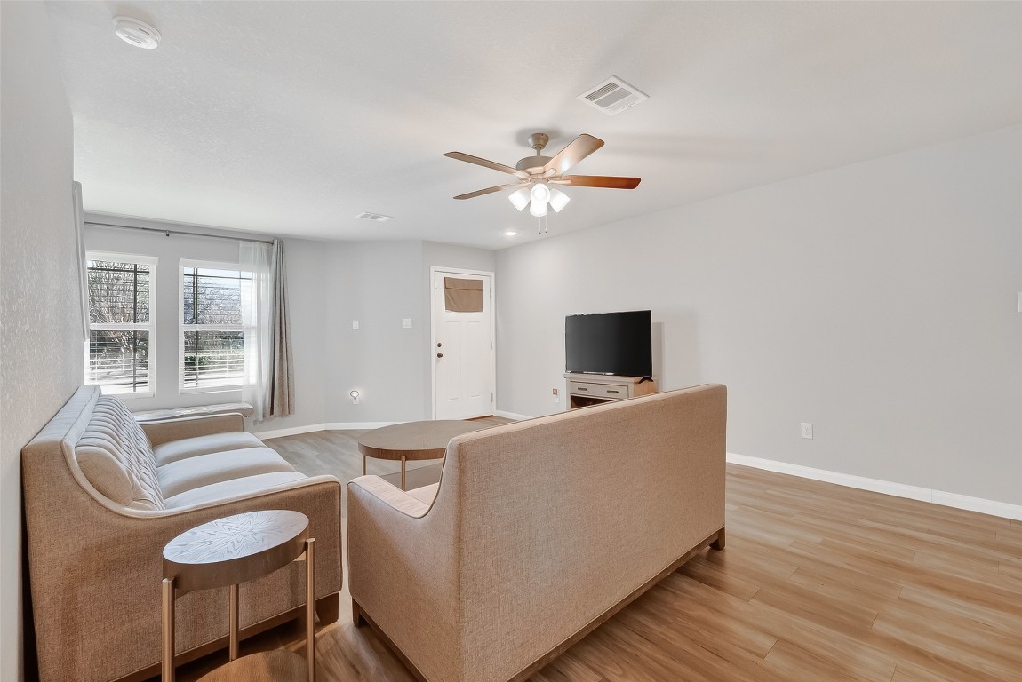 2516 Boss Street La Marque, TX 77568 - Photo 6 of 46 a living room with furniture and a flat screen tv