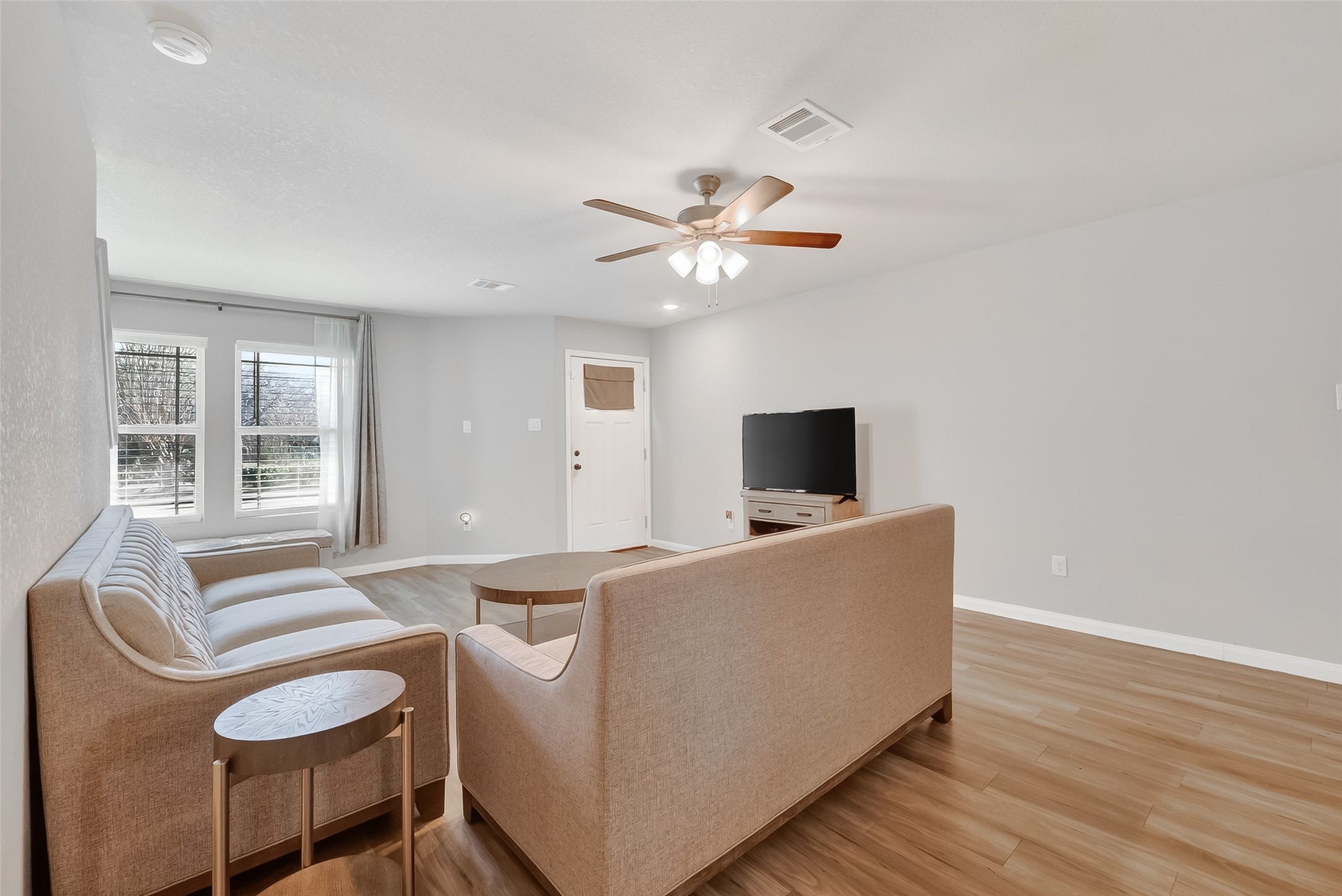 2516 Boss Street La Marque, TX 77568 - Photo 6 of 46 a living room with furniture and a flat screen tv