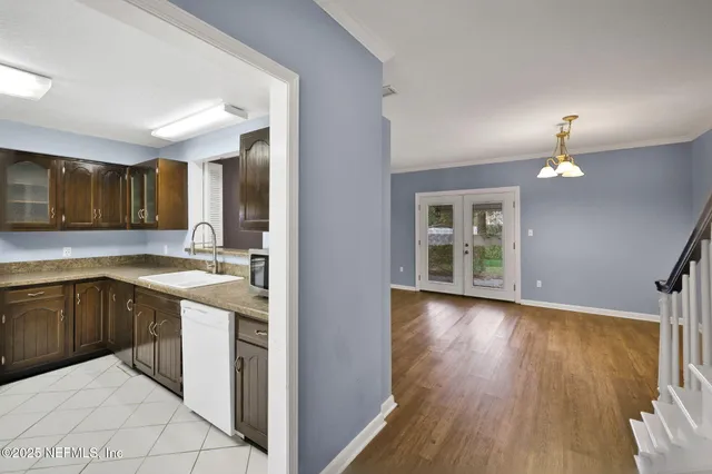 a view of entryway with wooden floor