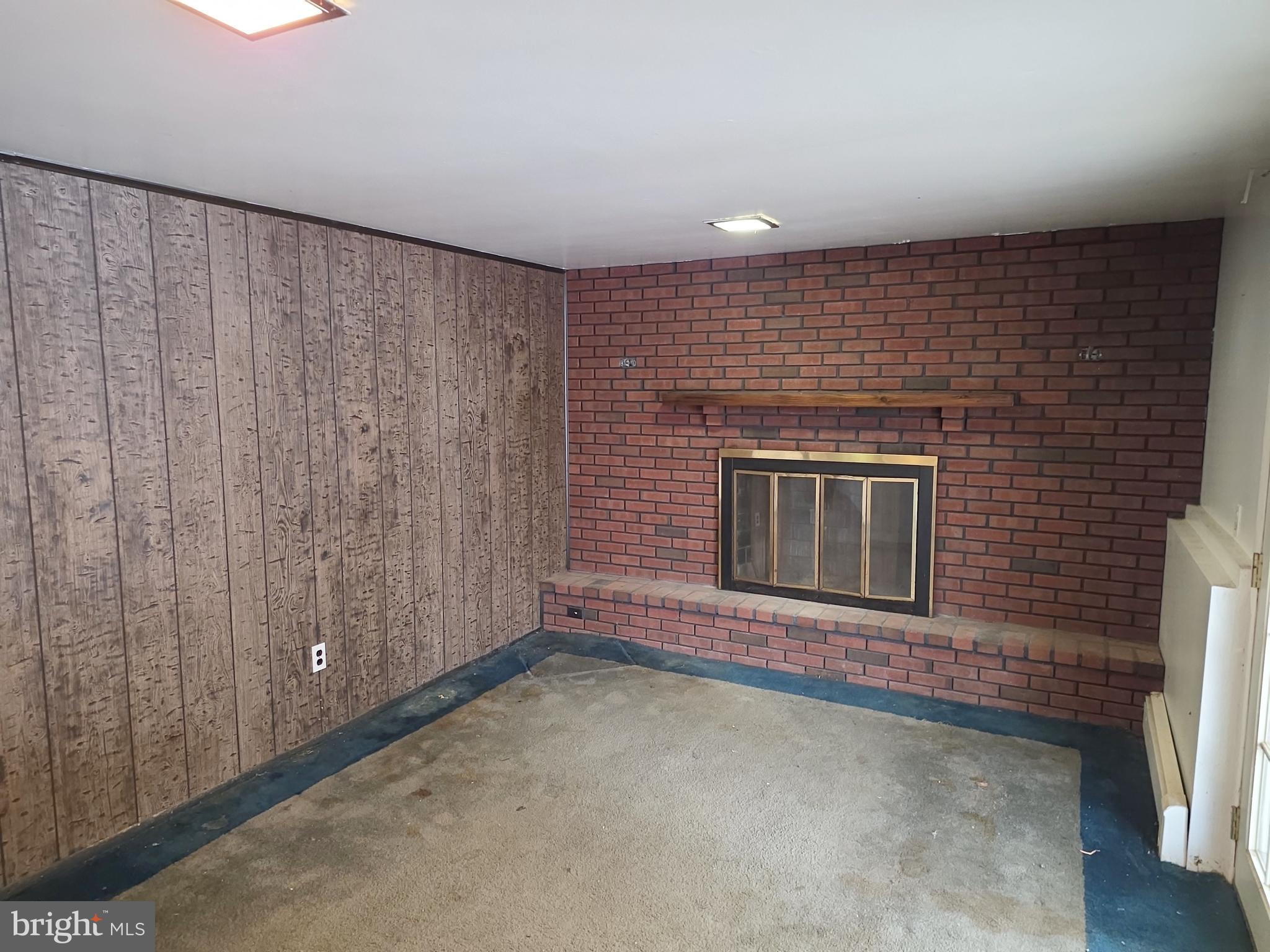 60 Carter Road Princeton, NJ 08540 - Photo 15 of 43 a view of an empty room with a fireplace