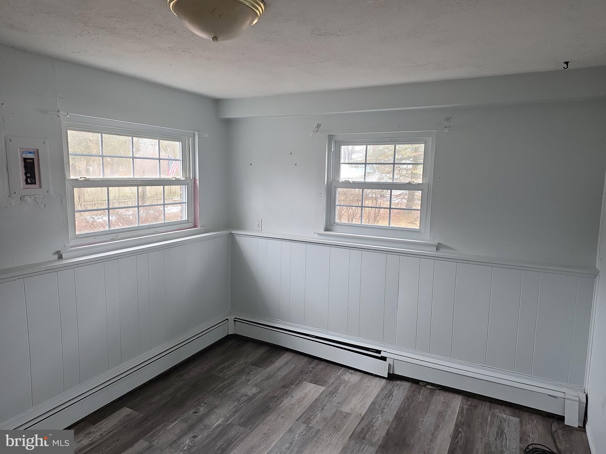 60 Carter Road Princeton, NJ 08540 - Photo 21 of 43 an empty room with wooden floor and windows