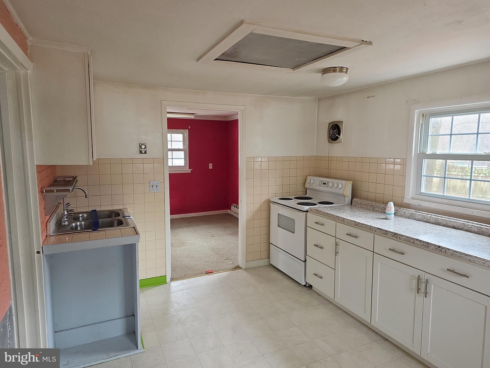 60 Carter Road Princeton, NJ 08540 - Photo 28 of 43 a kitchen with sink a stove and cabinets
