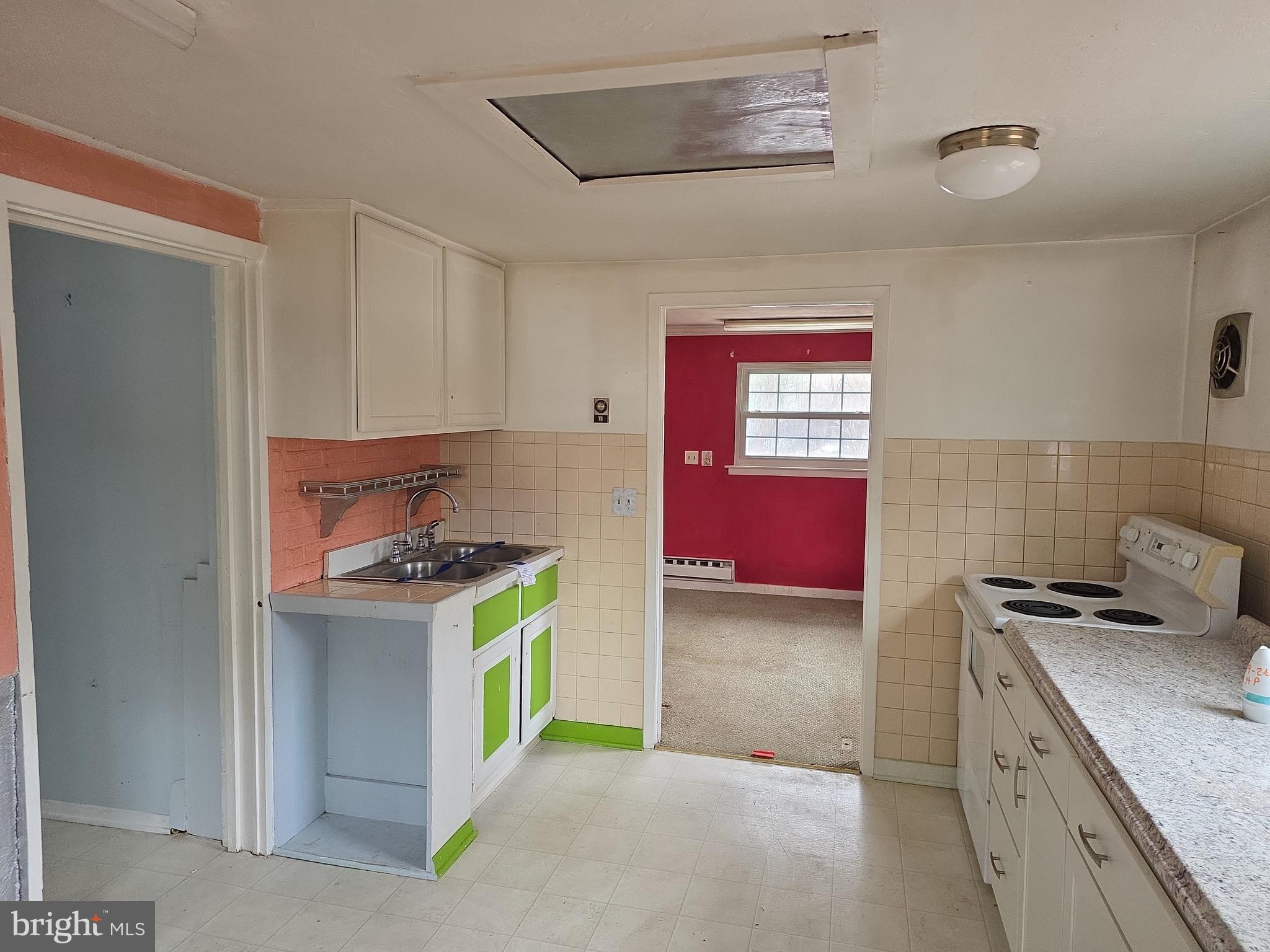 60 Carter Road Princeton, NJ 08540 - Photo 29 of 43 a kitchen with a stove and a cabinets