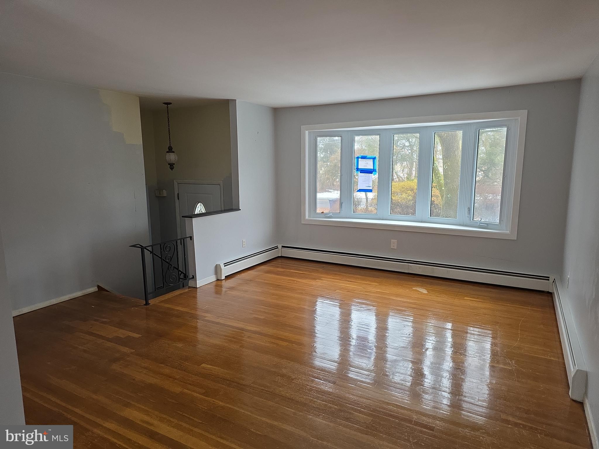 60 Carter Road Princeton, NJ 08540 - Photo 3 of 43 wooden floor in an empty room with a window