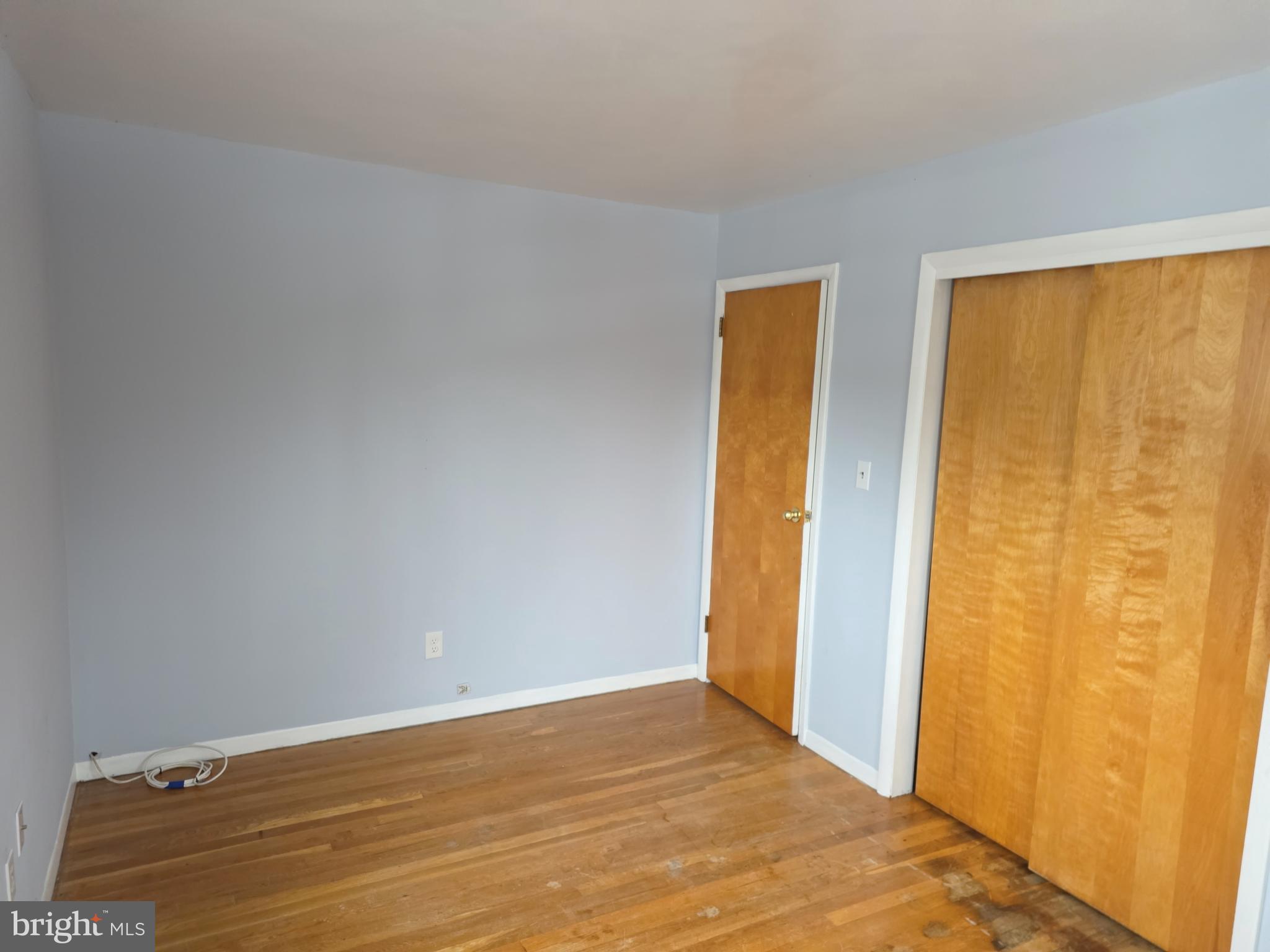 60 Carter Road Princeton, NJ 08540 - Photo 39 of 43 a view of an empty room with wooden floor and a window