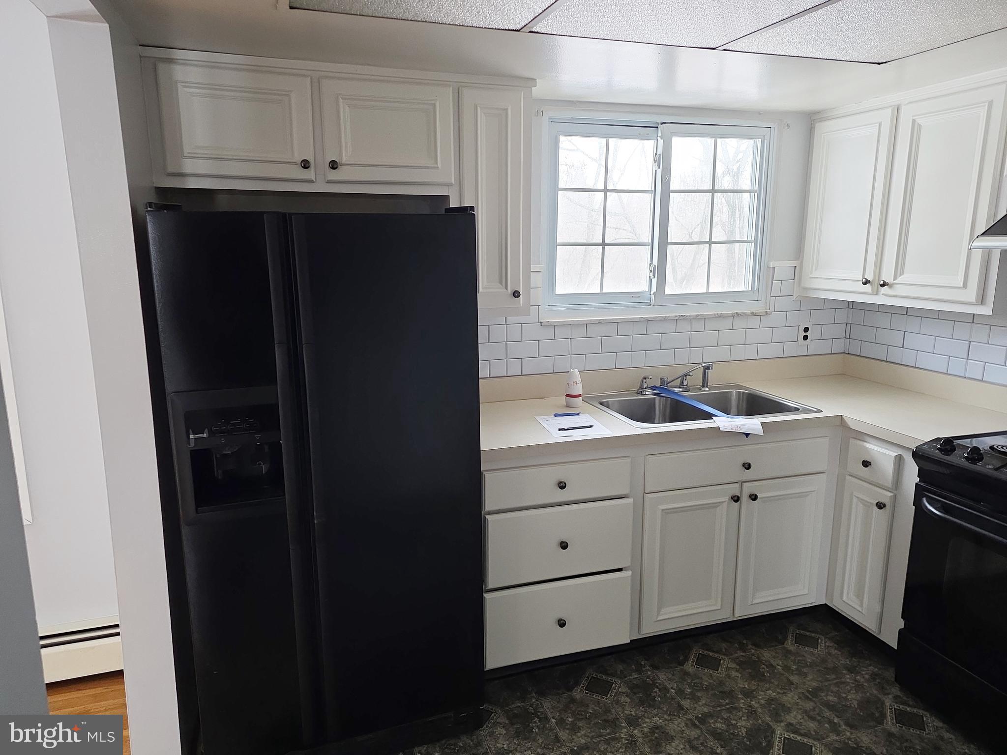 60 Carter Road Princeton, NJ 08540 - Photo 7 of 43 a kitchen with a sink and a window