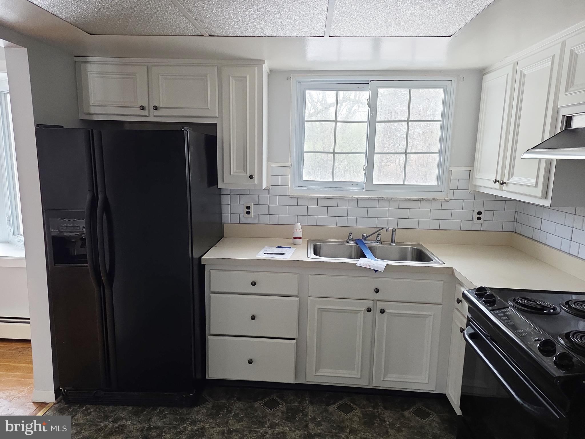 60 Carter Road Princeton, NJ 08540 - Photo 9 of 43 a kitchen with granite countertop a refrigerator and a sink