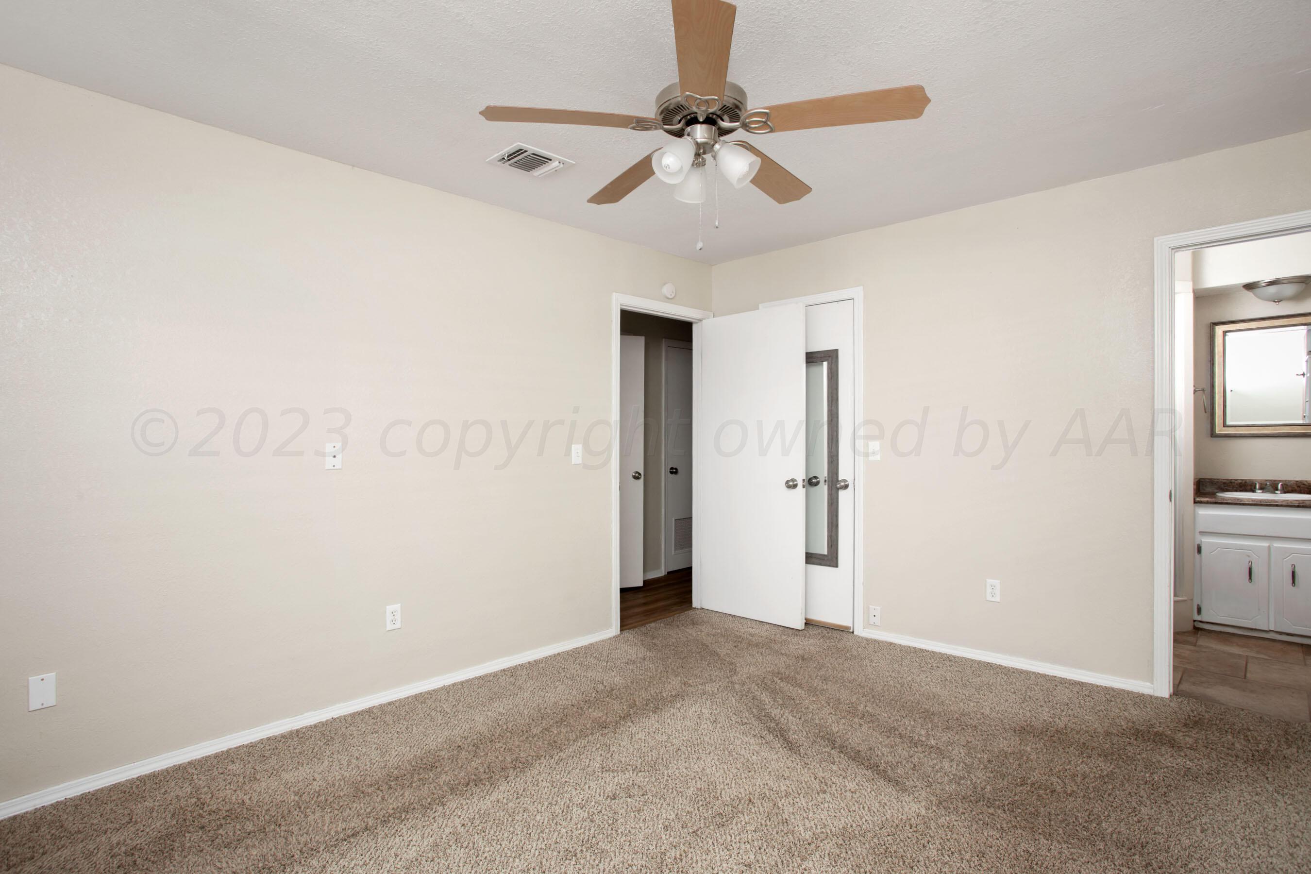 2905 Salem Drive Amarillo, TX 79110 - Photo 21 of 29 a view of a livingroom with a chandelier fan