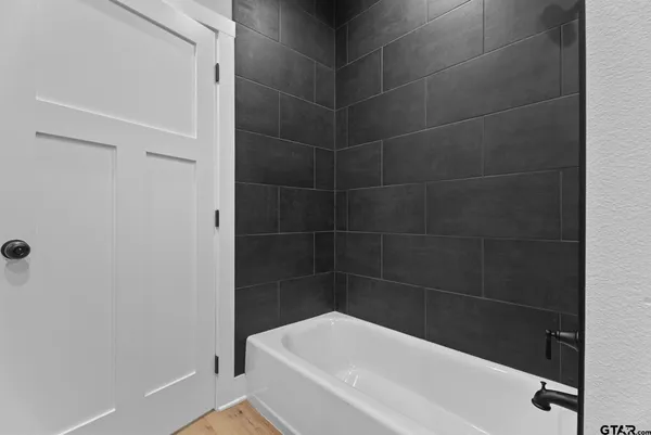 a bathroom with a bathtub