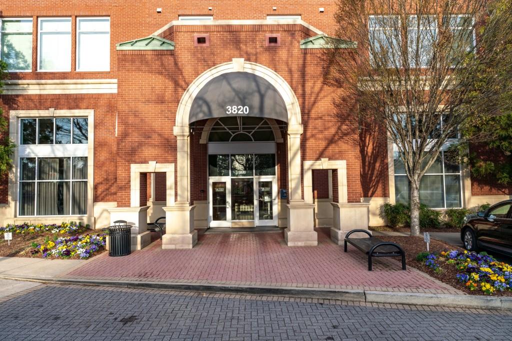 3820 Roswell Road Northeast, Unit 705 Atlanta, GA 30342 - Photo 13 of 62 a front view of a house with a outdoor space