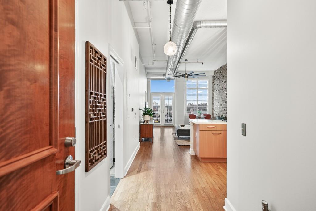 3820 Roswell Road Northeast, Unit 705 Atlanta, GA 30342 - Photo 15 of 62 a view of a kitchen from the hallway