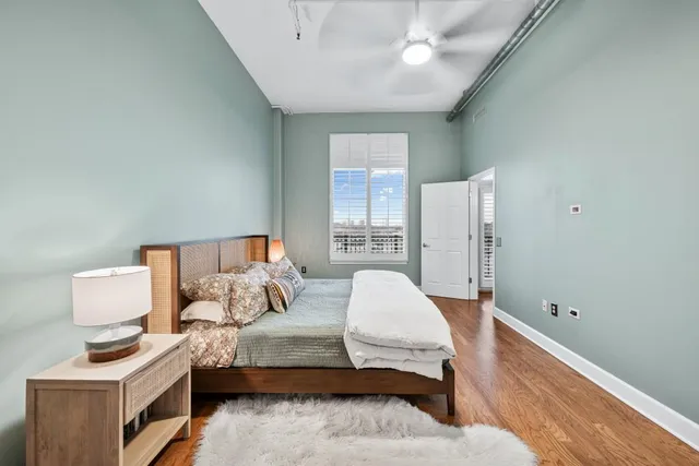 a view of kitchen island with furniture and wooden floor