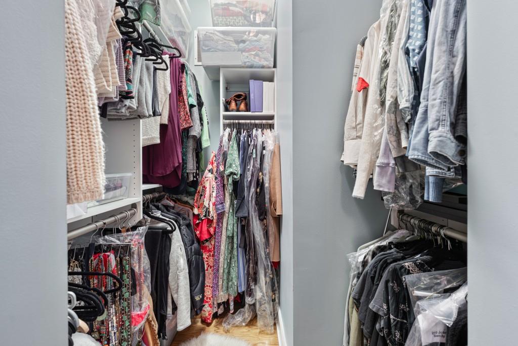 3820 Roswell Road Northeast, Unit 705 Atlanta, GA 30342 - Photo 25 of 62 a view of walk in closet with clothes