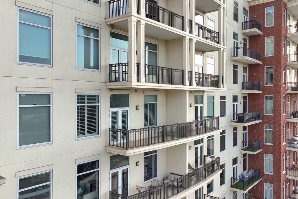 3820 Roswell Road Northeast, Unit 705 Atlanta, GA 30342 - Photo 33 of 62 a tall building with a lot of windows