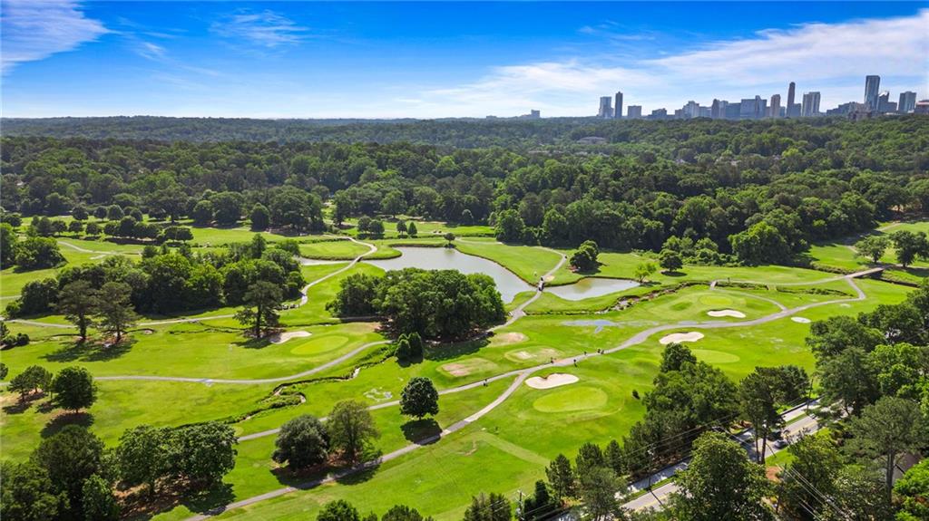 3820 Roswell Road Northeast, Unit 705 Atlanta, GA 30342 - Photo 44 of 62 a view of a swimming pool with a yard