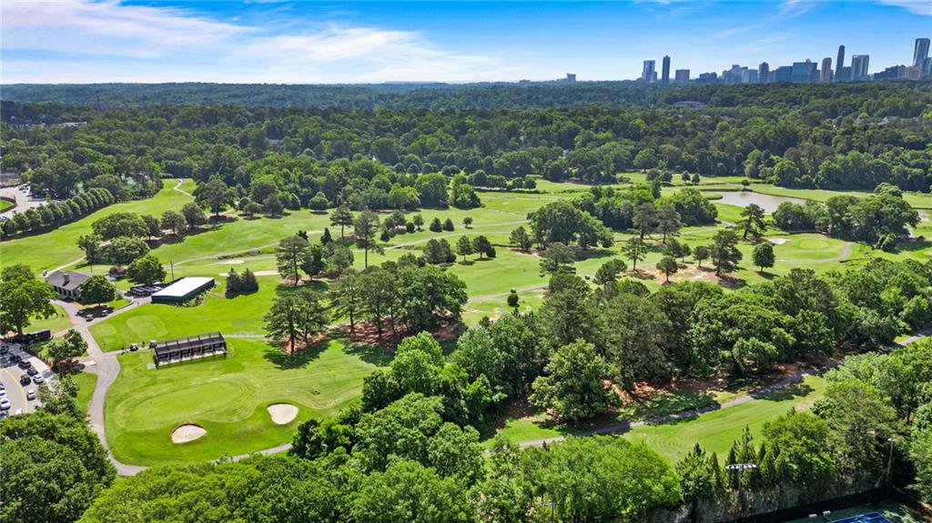 3820 Roswell Road Northeast, Unit 705 Atlanta, GA 30342 - Photo 46 of 62 an aerial view of residential houses with outdoor space and trees