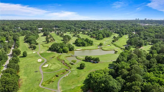 a view of front door and potted plants