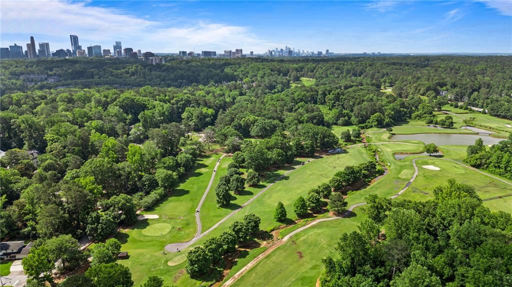 3820 Roswell Road Northeast, Unit 705 Atlanta, GA 30342 - Photo 53 of 62 a view of a lush green field