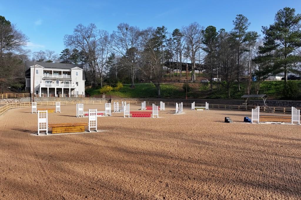 3820 Roswell Road Northeast, Unit 705 Atlanta, GA 30342 - Photo 56 of 62 a wooden bench with trees in the background