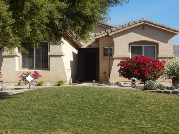 a front view of house with yard