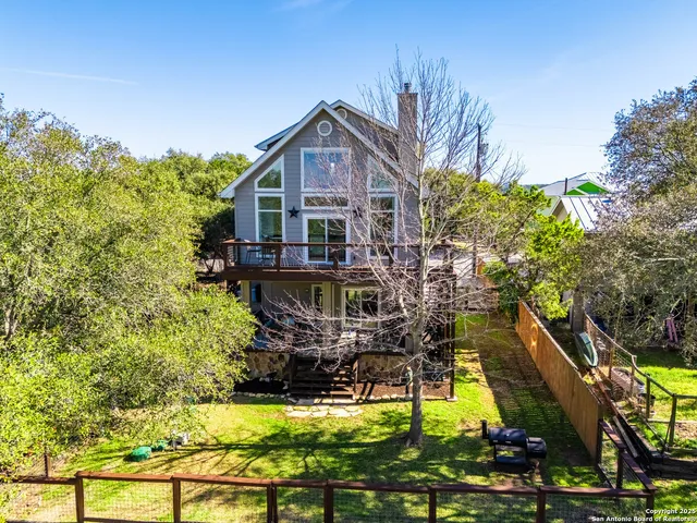 a view of a house with swimming pool