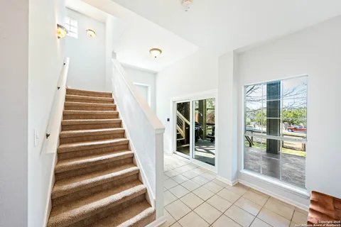 a view of an entryway with staircase