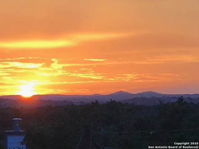 a view of lake with mountain