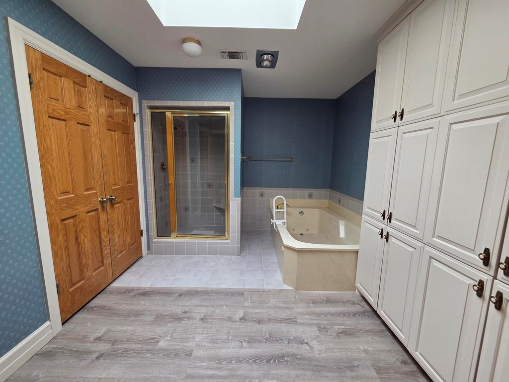 2212 Rock Creek Drive Kerrville, TX 78028 - Photo 22 of 36 wooden floor in a hall with an entryway