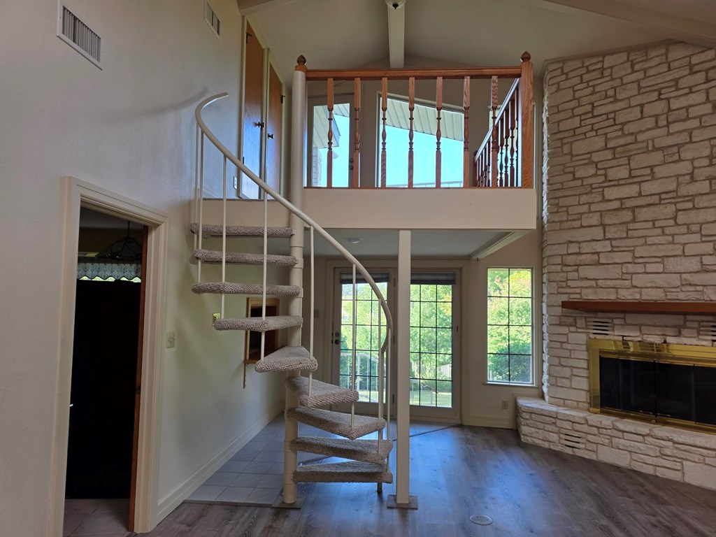 2212 Rock Creek Drive Kerrville, TX 78028 - Photo 25 of 36 wooden floor in an empty room with a window