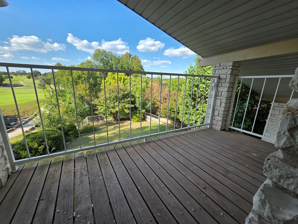 2212 Rock Creek Drive Kerrville, TX 78028 - Photo 30 of 36 a view of balcony with wooden floor