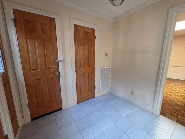 an empty room with windows