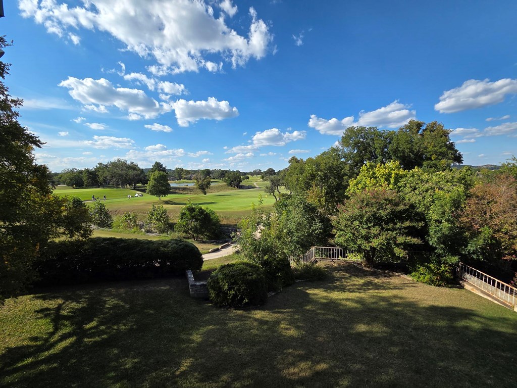 2212 Rock Creek Drive Kerrville, TX 78028 - Photo 31 of 36 a view of a street with an outdoor space