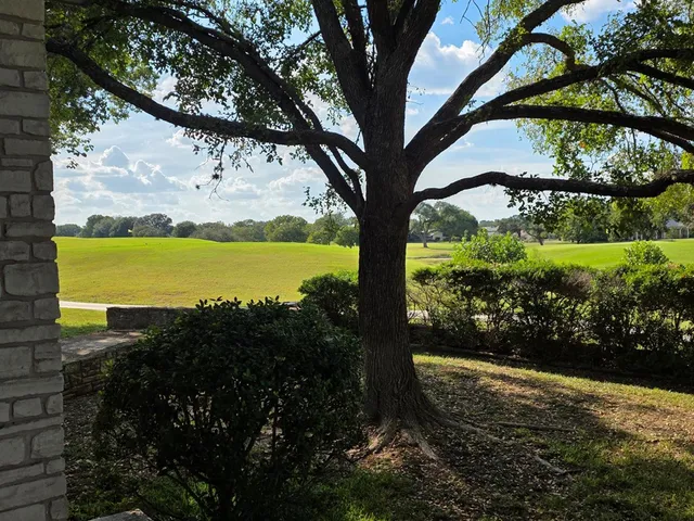 a view of a yard with an outdoor space