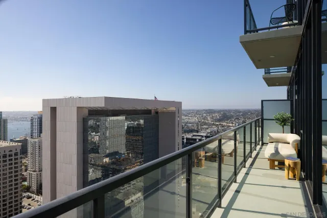 a table with a vase and flowers on it