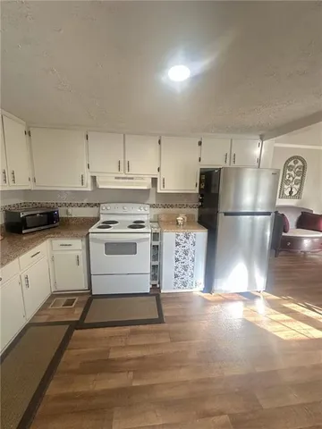 a living room with a couch and a table