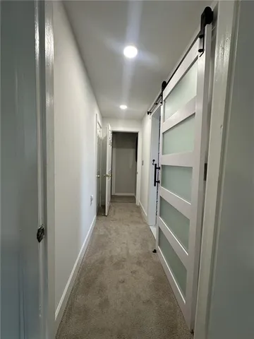 a view of entryway and workspace