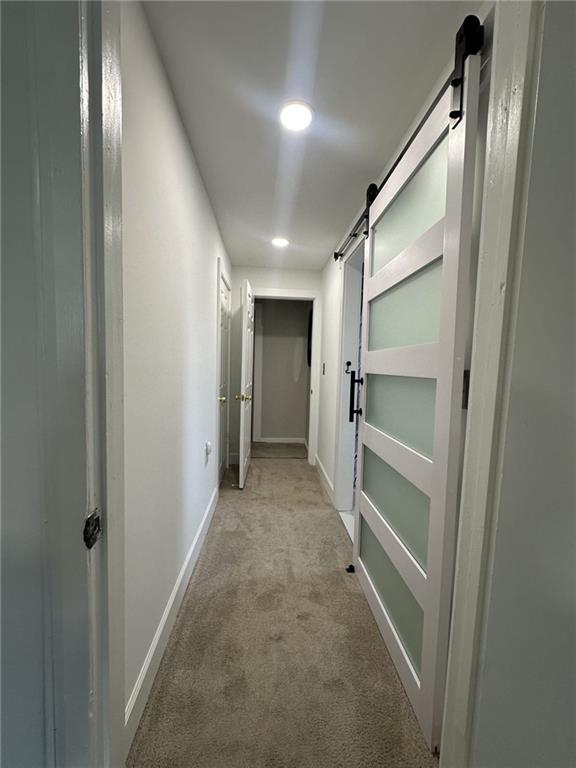 158 Rabbit Hill Road Dacula, GA 30019 - Photo 27 of 64 a view of hallway with stairs and a closet