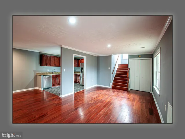 a view of kitchen with wooden floor