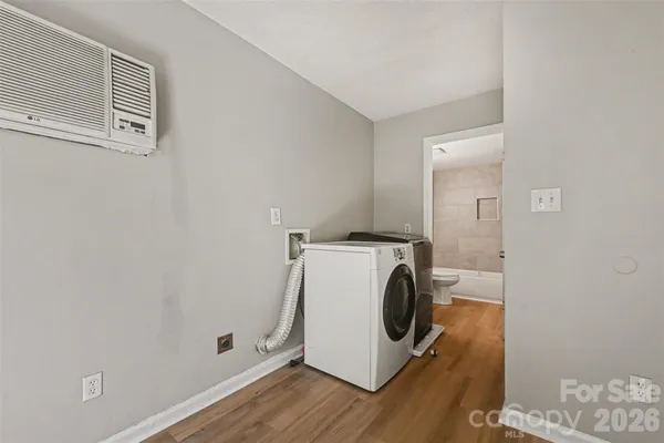 a utility room with dryer and washer