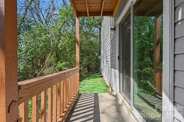 a view of a balcony with garden